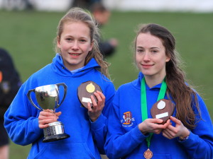 Sisters Ellie (left) and Hannah Hobbs with their gold and silver medals